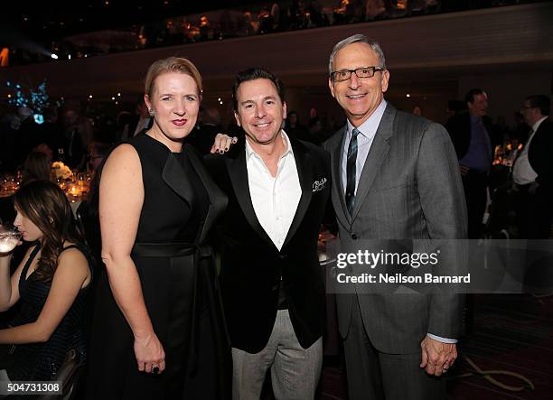 Chief Merchandising Officer, Macy's Tim Baxter poses for a photo with Chairman Emeritus, YMA FSF / Global Brands Group Jim Rosenfeld and guest at YMA...