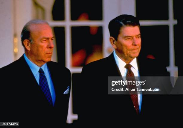 George P. Shultz;Ronald W. Reagan, News Photo