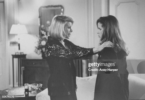 Comedian/actress Joan Rivers w. Hands on shoulders of daughter Melissa in scene fr. Tears & Laughter: The Joan & Melissa Rivers Story, an...