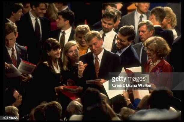 Repub. Incumbent's running mate VP Dan Quayle signing autographs amid admiring crowd before/after vice-presidential debate at Georgia Tech.