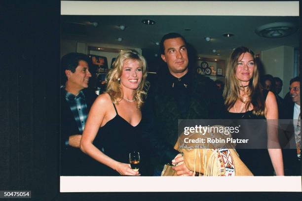 Producer Jon Peters, model Vendela, actor Steven Seagal & model Carol Alt at opening of Warner Bros. Studio Store.