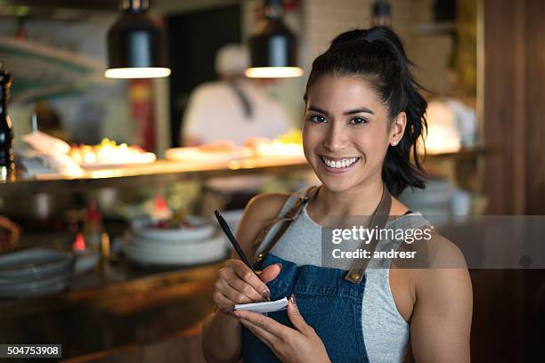 happy waitress working at a coffee shop - australian cafe stock pictures, royalty-free photos & images