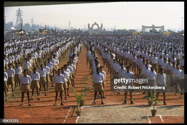 Members of Hindu nationalist Rashtriya Swayamsevak Sangh standing, row formation, at attention during RSS annual function.