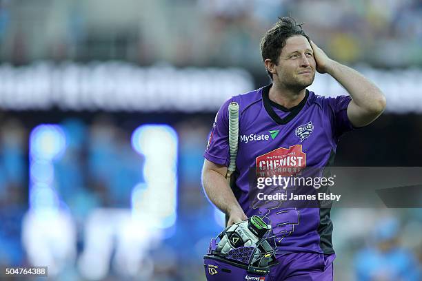 Michael Hill of Hobart after losing his wicket during the Big Bash League match between the Adelaide Strikers and the Hobart Hurricanes at Adelaide...