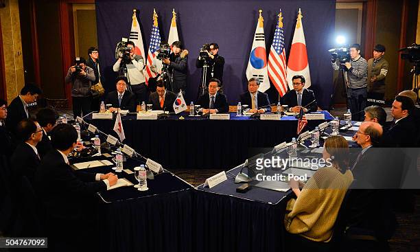 South Korea's delegation Hwang Joon-Kook led by Special Representative for Korean Peninsula Peace and Security Affairs, top, U.S. Delegation and...