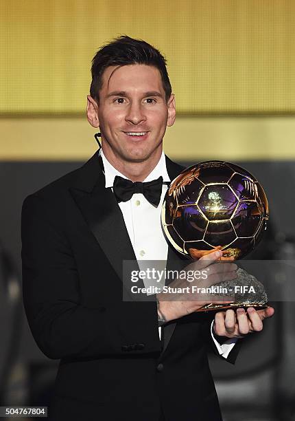 Ballon d'Or winner Lionel Messi of Argentina and Barcelona accepts his award during the FIFA Ballon d'Or Gala 2015 at the Kongresshaus on January 11,...