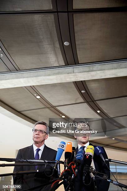 German Interior Minister Thomas de Maiziere and German Justice Minister Heiko Maason giving a statement to the press on January 12, 2016 in Berlin,...