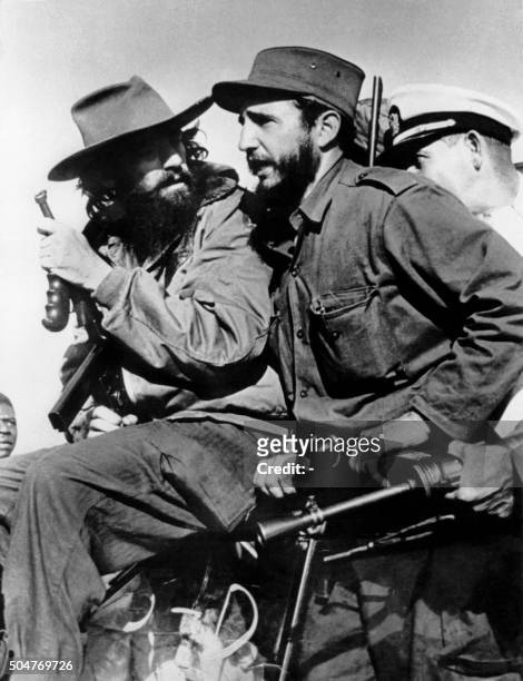 The Cuban rebel leader Fidel Castro , surrounded by the members of his leftist guerrilla movement "26th of July Movement", in which other revolution...