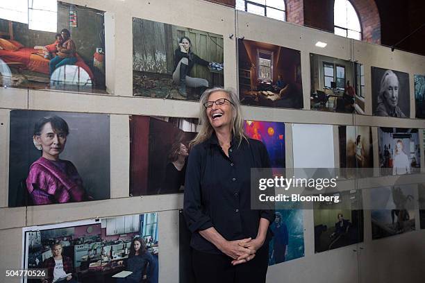 Annie Leibovitz, portrait photographer, poses with her photographs on display at the launch of WOMEN: New Portraits exhibition at Wapping Hydraulic...