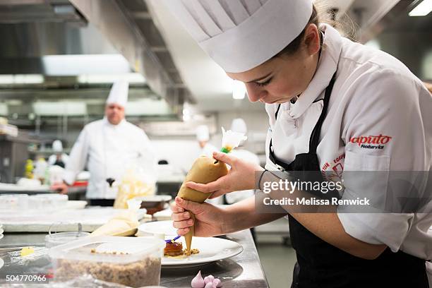 Pastry chef, Megan Proper, prepares an apple praline with apricot sorbet, accompanied with ice wine mousse, leche de creme and raspberry accessories.