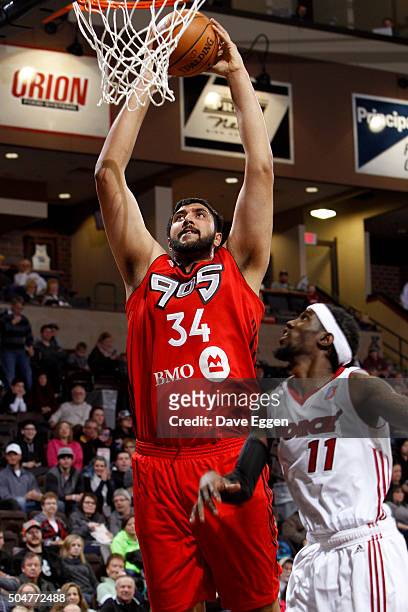 Sim Bhullar of the Toronto Raptors 905 dunks the ball against the Sioux Falls Skyforce at the Sanford Pentagon on January 12, 2016 in Sioux Falls,...
