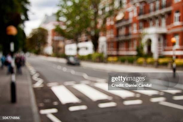 abbey road zebra crossing, london (united kingdom) - abbey road london stock-fotos und bilder