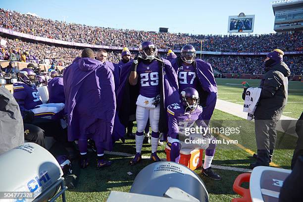 Playoffs: Minnesota Vikings Xavier Rhodes , Everson Griffen and Captain Munnerlyn on sidelines during game vs Seattle Seahawks at US Bank Stadium....