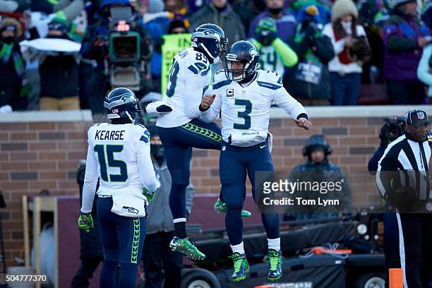 Playoffs: Seattle Seahawks QB Russell Wilson victorious with Doug Baldwin during game vs Minnesota Vikings at US Bank Stadium. Minneapolis, MN...
