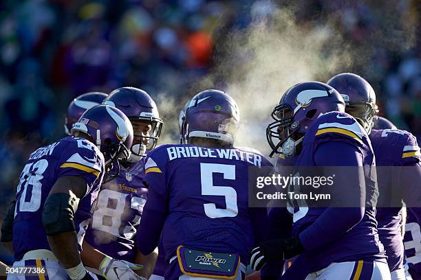 Playoffs: Rear view of Minnesota Vikings QB Teddy Bridgewater in huddle with teammates during game vs Seattle Seahawks at US Bank Stadium....