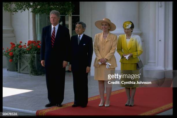 Pres. Bill & Hillary Rodham Clinton hosting Japanese royals Emperor Akihito & Empress Michiko at WH, treading red carpet in N. Portico departure fete.