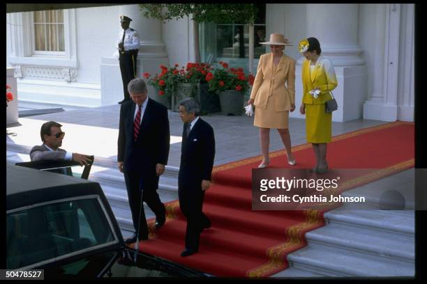 Pres. Bill Clinton escorting Japanese Emperor Akihito to limo w. Wives Empress Michiko & Hillary Rodham Clinton in tow, in WH N. Portico departure...