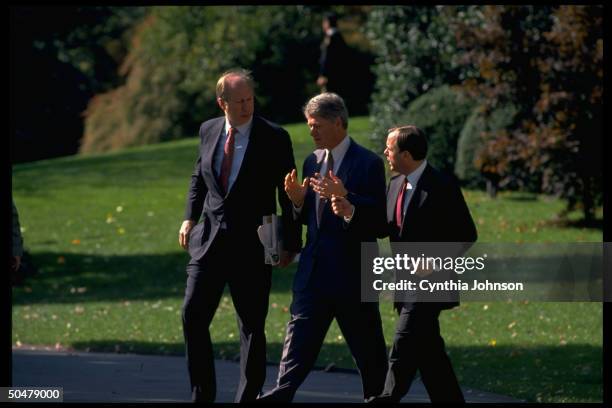 Pres. Bill Clinton chatting w. WH communications dir. David Gergen & chief of staff Mack McLarty, walking to S. Lawn, departing on trip to KY.