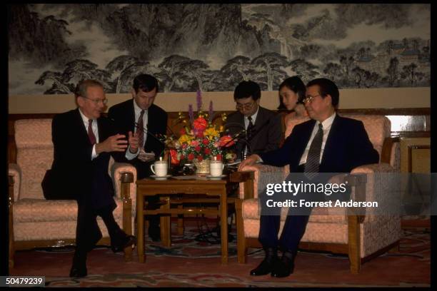 Chinese Premier Li Peng mtg. W. US Natl. Security Adviser Tony Lake , interpreters in tow.