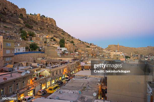 traditional houses at narrow street of middleeastern town mardin turkey - touristical stock pictures, royalty-free photos & images