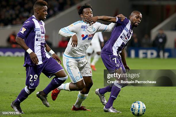 Michy Batshuayi for Marseille battle for the ball with Jean Daniel Akpa Akpro and Jacques Francois Moubandje during the French League Cup quarter...
