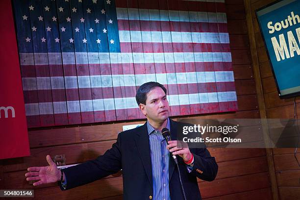 Republican presidential candidate Sen. Marco Rubio speaks to guests during a campaign rally at the Water Dog Grill on January 13, 2016 in Mount...