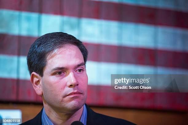 Republican presidential candidate Sen. Marco Rubio speaks to guests during a campaign rally at the Water Dog Grill on January 13, 2016 in Mount...