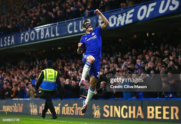 Cesar Azpilicueta of Chelsea celebrates scoring his team's first goal during the Barclays Premier League match between Chelsea and West Bromwich...