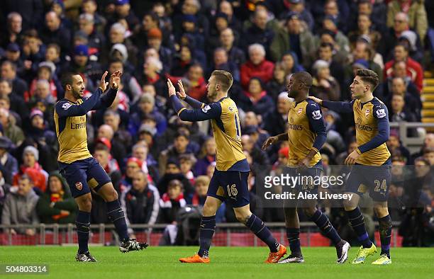 Aaron Ramsey of Arsenal celebrates scoring his team's first goal with his team mates Theo Walcott , Joel Campbell and Hector Bellerin during the...