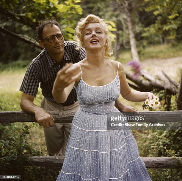 Marilyn Monroe with her husband, playwright Arthur Miller, at their home in 1957 in Amagansett, New York.