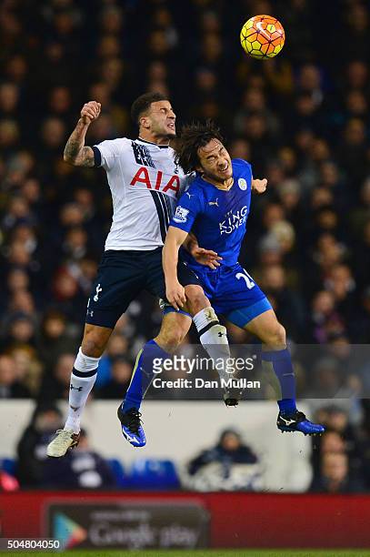Kyle Walker of Tottenham Hotspur and Shinji Okazaki of Leicester City compete for the ball during the Barclays Premier League match between Tottenham...