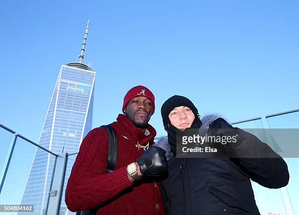 Deontay Wilder and Artur Szpilka pose for a picture during a portrait and media availability on the terrace at Four World Trade Center on January 13,...