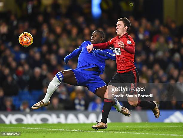 Kurt Zouma of Chelsea and Craig Gardner of West Bromwich Albion compete for the ball during the Barclays Premier League match between Chelsea and...