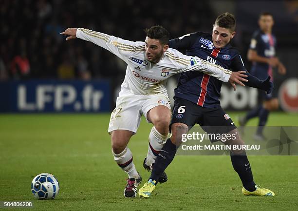 Paris Saint-Germain's Italian midfielder Marco Verratti fights for the ball with Lyon's French midfielder Jordan Ferri on January 13, 2016 at the...