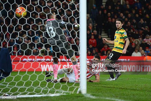 Jonathan Walters of Stoke City scores his team's first goal past Declan Rudd of Norwich City during the Barclays Premier League match between Stoke...