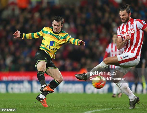 Jonathan Howson of Norwich City scores his team's first goal during the Barclays Premier League match between Stoke City and Norwich City at the...