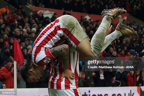 Jonathan Walters of Stoke City celebrates after scoring a goal to make it 1-0 with Joselu during the Barclays Premier League match between Stoke City...