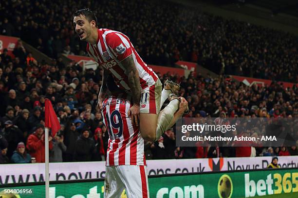 Jonathan Walters of Stoke City celebrates after scoring a goal to make it 1-0 with Joselu during the Barclays Premier League match between Stoke City...