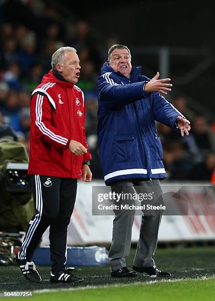 Alan Curtis caretaker Manager of Swansea City and Sam Allardyce, manager of Sunderland look on during the Barclays Premier League match between...