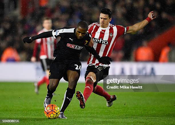 Odion Ighalo of Watford is tackled by Jose Fonte of Southampton during the Barclays Premier League match between Southampton and Watford at St....