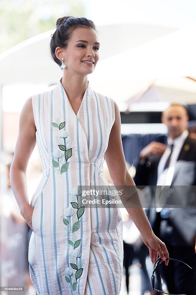 Russian actress Paulina Andreeva, wearing BVLGARI, poses to a... News ...