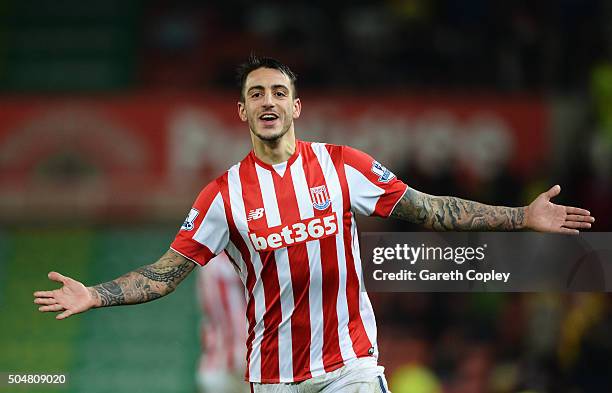 Joselu of Stoke City celebrates scoring his team's second goal during the Barclays Premier League match between Stoke City and Norwich City at the...
