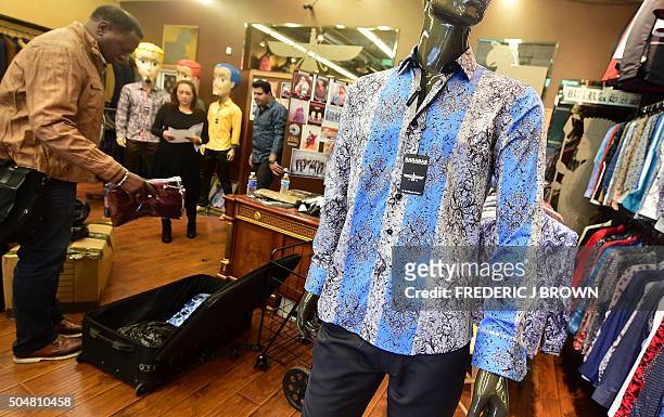 Shirt known as "Fantasy," a replica of the shirt worn by Mexican drug-lord Joaquin 'El Chapo' Guzman is prominently displayed for sale at Barabas, a...