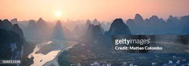 panoramic sunset over li river and karst mountains, china - guilin stock pictures, royalty-free photos & images