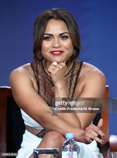 Actress Monica Raymund, of 'Chicago Fire' speaks onstage during the 'Chicago Fire', 'Chicago P.D.' and 'Chicago Med' panel discussion at the...