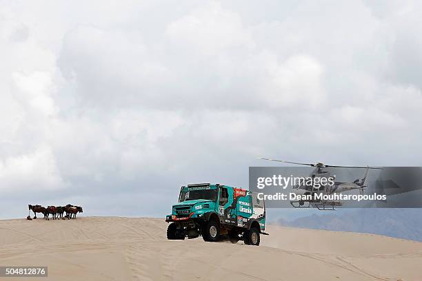 Gerard De Rooy of the Netherlands, Darek Rodewald of Poland and Moisievse Torrallardona of Spain of PETRONAS TEAM DE ROOY IVECO and in truck...