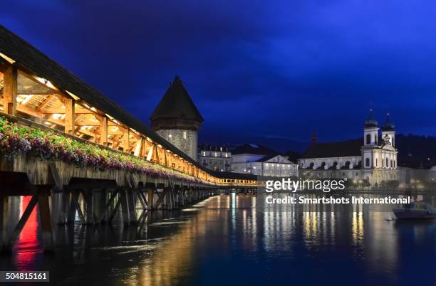 lucerne skyline at dusk with reflection on lake - skyline luzern stock pictures, royalty-free photos & images