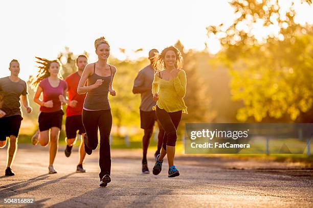 sunny day for a run - fat guy running bildbanksfoton och bilder