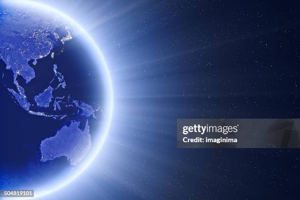 glowing blue globe - east asia and oceania - pacific ocean stockfoto's en -beelden