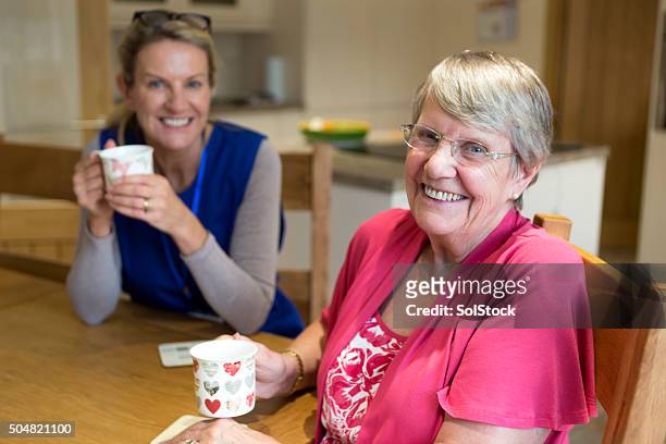 enjoying the company! - charity and relief work stock pictures, royalty-free photos & images